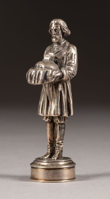 Auction 131<br>A SILVER FIGURE OF A RUSSIAN PEASANT PRESENTING A LOAF OF BREAD AND SALT THRONE