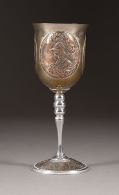 Auction 131<br>A BRASS GOBLET WITH MEDALS