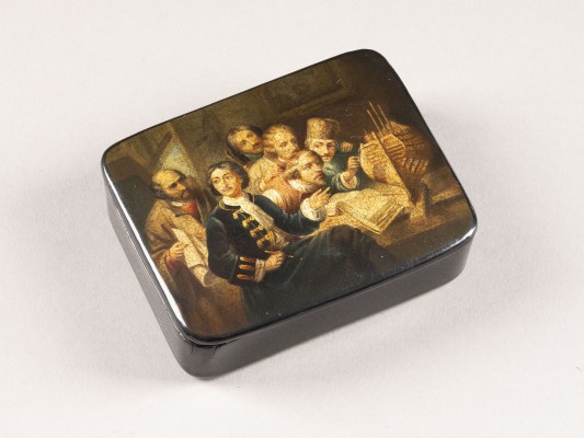 Auction 131<br>A PAPIER-MACHÉ AND LACQUER BOX DEPICTING PETER THE GREAT EXPLAINING A MODEL OF A SHIP