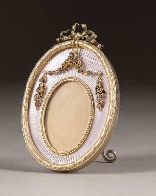 Auction 131<br>A SILVER-GILT AND GUILLOCHÉ ENAMEL PHOTO FRAME