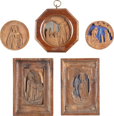 Auction 131<br>A COLLECTION OF FIVE CARVED WOODEN ICONS SHOWING THE ANNUNCIATION AND SELECTED SAINTS