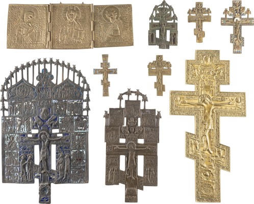 Auction 131<br>NINE BRASS ICONS: A TRIPTYCH SHOWING THE DEISIS AND EIGHT BRASS CRUCIFIXES