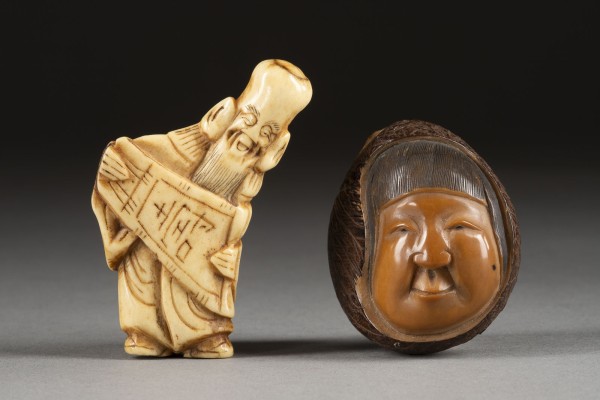 Auction 132<br>EIN NETSUKE VON FUKUROKUJU AUS HIRSCHHORN UND EIN NETSUKE EINES WEIBLICHEN GESICHTES AUS TAGUANUSS