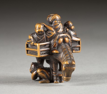 Auction 132<br>EIN FEINES HOLZGESCHNITZTES NETSUKE VON SAMBO KOJIN